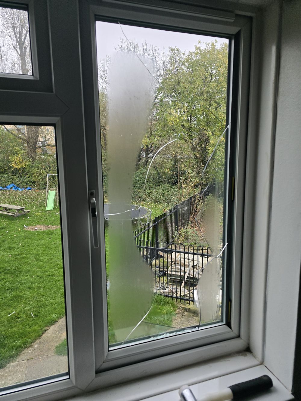 Broken window glass before replacement