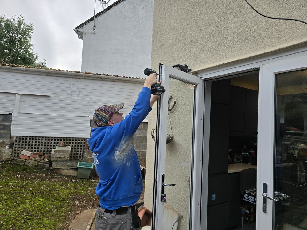 Door lock repair being carried out in Bristol home